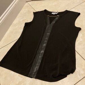 Black sleeve-less Calvin Klein Top.